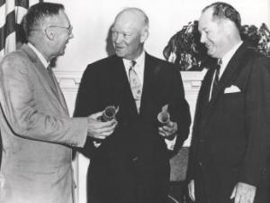 President Eisenhower commissions Dr. T. Keith Glennan as first administrator and Dr. Hugh Dryden as assistant administrator